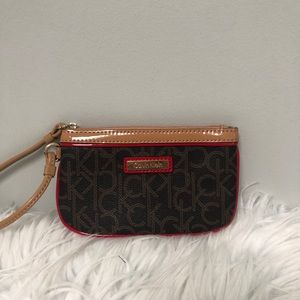 CK wristlet with wrist strap. 7x4